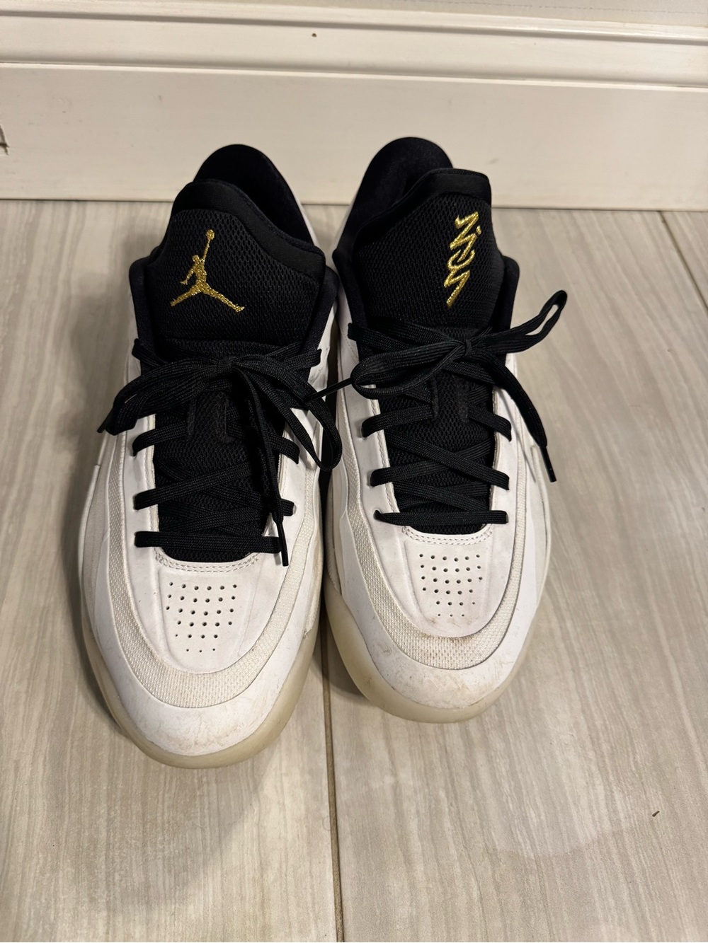 Nike Black and White Jordan Sneakers with Gold Logo